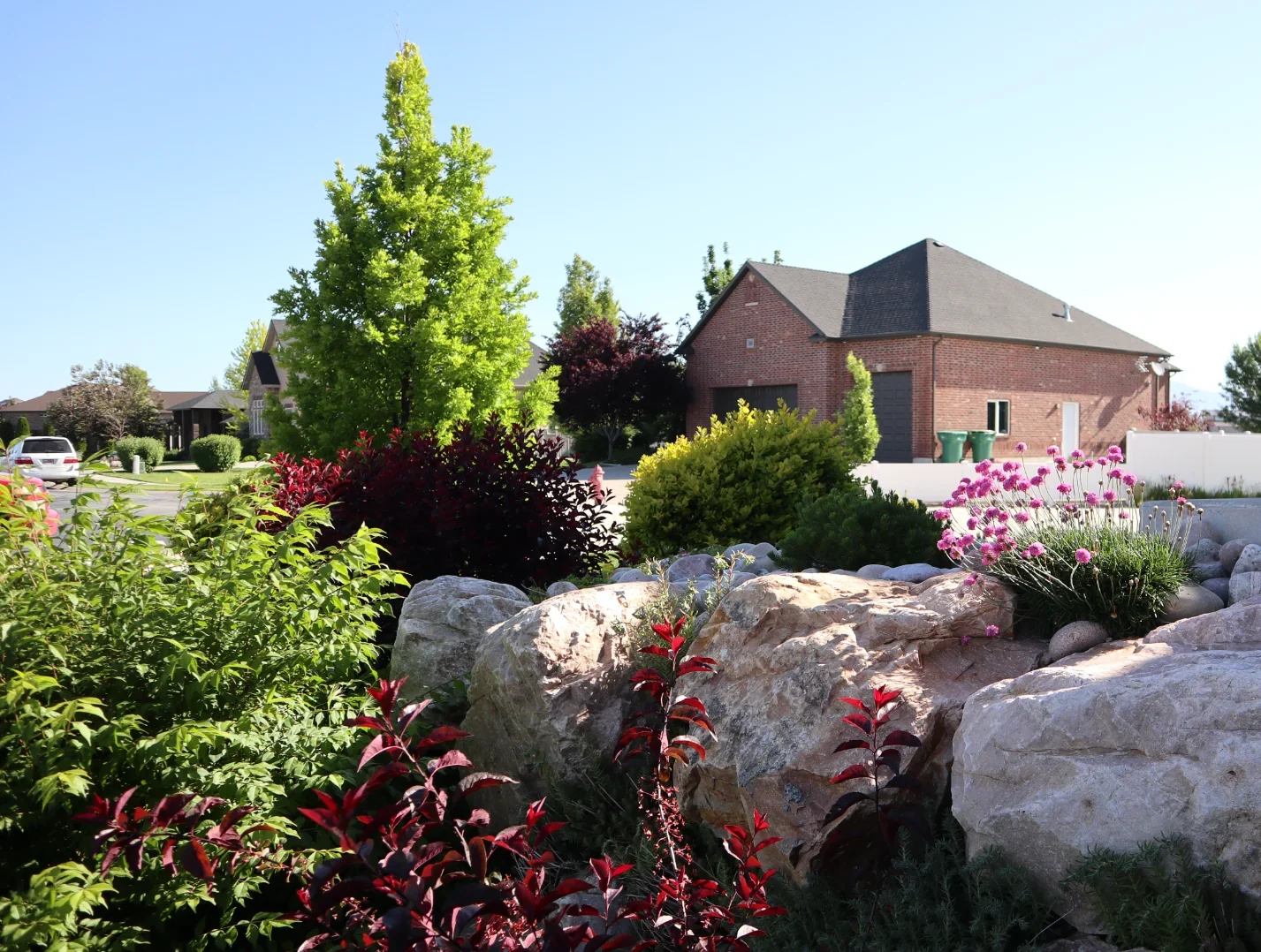Aerial view of residential properties and green spaces near Perry Nature Park in Perry, Utah, highlighting the local landscape of Box Elder County